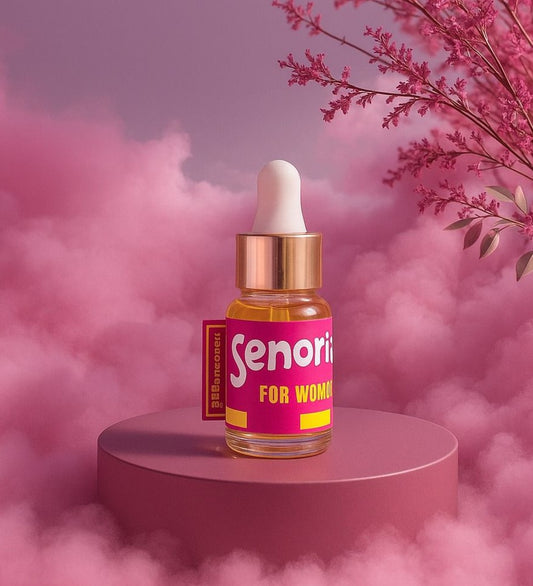 Cosmetic dropper bottle with pink label on a pink platform with pink smoke and flowers.